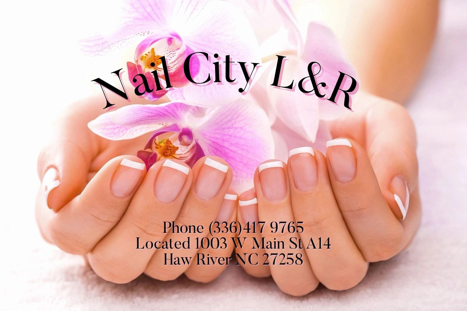 Well-manicured hands with French tips holding a pink orchid, advertising Nail City L&R.