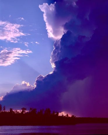 Massive dark rain clouds hide the sun over Loud’s Island