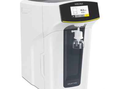 Compact white water purification device with digital display.