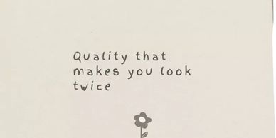 Inspirational text with a small flower illustration.