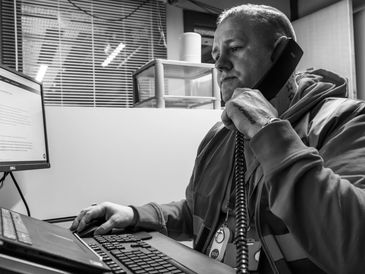 A dedicated volunteer on the phone