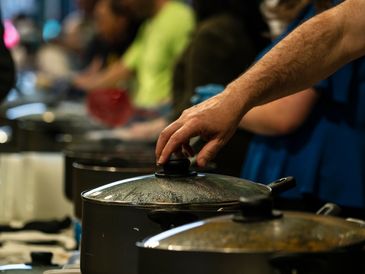 Multiple pots at the soup kitchen