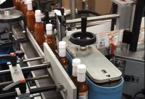 Fully automated label application for our hot sauce co-packing and private label hot sauce programs.
