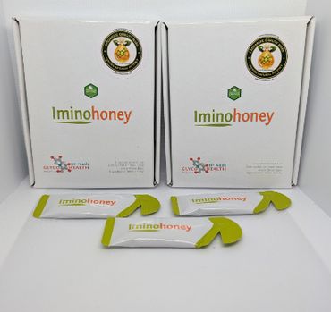 Two boxes and four sachets of Iminohoney dietary supplement displayed.