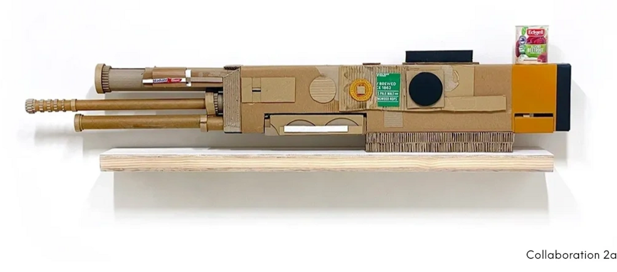 cardboard construction in the shape of a gun.