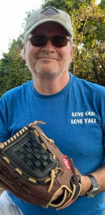 Blue tee with white letters.