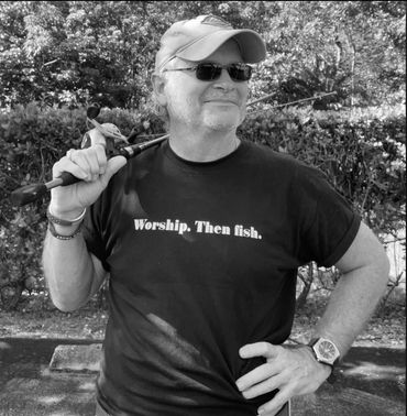 Black tee with white letters.