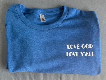 Blue tee with white type.