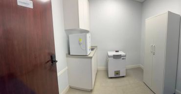 Pharmacy with restricted electronic access, featuring keyed locks for the storage closet and freezer