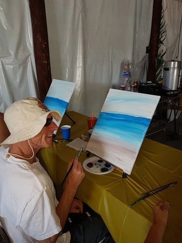 Painting made by a blind painter that was at a Paint party with Paint it Priti