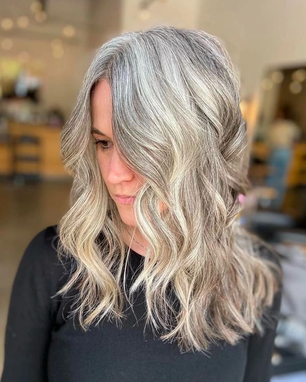 Classic highlights and long layered cut by Meredith