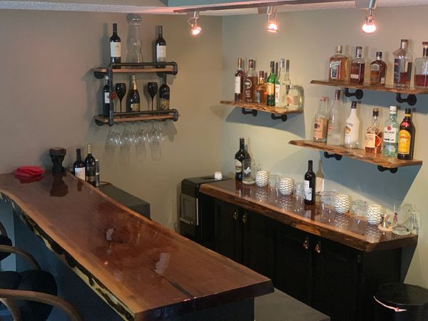 Live Edge Walnut bar with shelves and wine rack