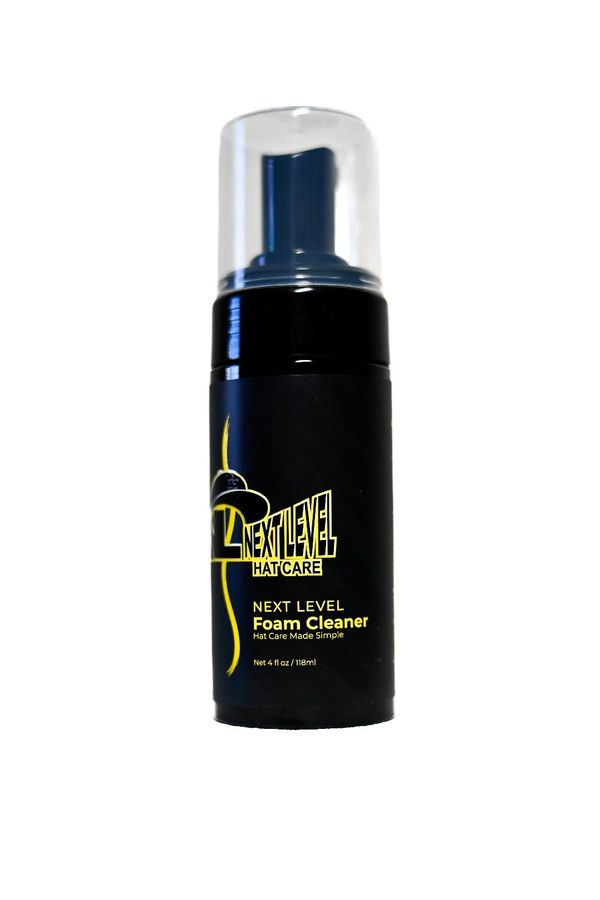 Next Level Foam Cleaner for hat care in a black bottle with yellow text.