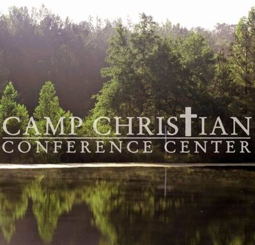 Peaceful lake and trees at Camp Christian Conference Center.