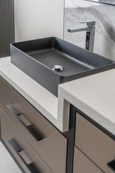 Clean, sleek look of modern commercial bathroom vanity in King City