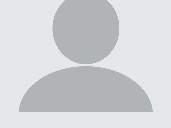 Gray user profile icon on light background.