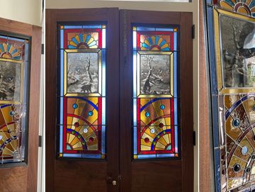Full re-lead restoration for these nature scene windows in South Philly.