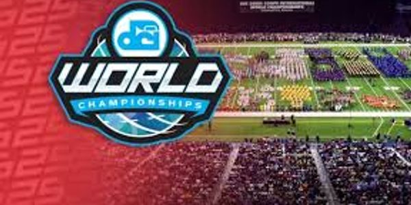 Marching bands perform at the DCI World Championships in a packed stadium.