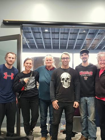 Community Rebuild Initiative (CRI) at Mountain Aid Project HQ proudly pose after a productive day of