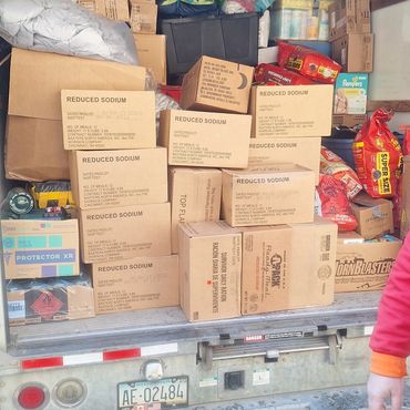 A fully loaded box truck from North Carolina is on its way to West Virginia, delivering essential su