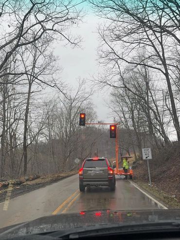 In the heart of the disaster zone, random stoplights stand as silent witnesses to the chaos, becomin
