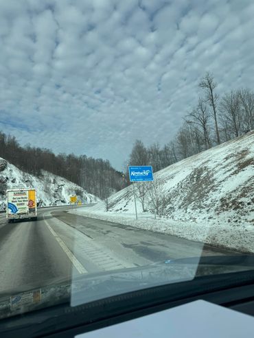 Crossing into Kentucky, we marvel at the stunning, snow-covered mountain peaks. A picturesque journe