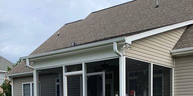 Screen Porches on Raised Patio with Brick Curtain Wall, Paved Walkways,
