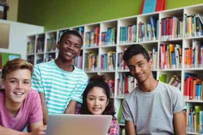 A group of school students in a classroom