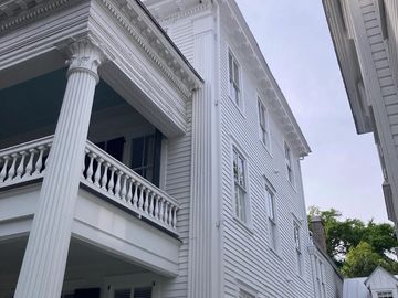Historic Charleston Exterior Restoration | Detailed exterior painting, trim work, columns, and siding completed by LG Painting + Construction in downtown Charleston, SC.