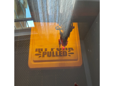 Engraving in process. Can support surface areas up to 22x18