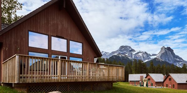 Cabin with Peter Lougheed mountain in the background