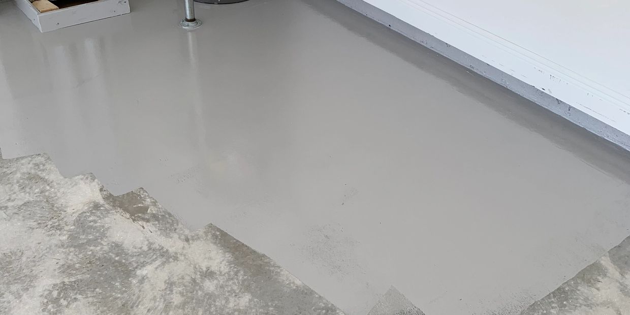 Solid Color Epoxy Garage Floor Being Rolled On