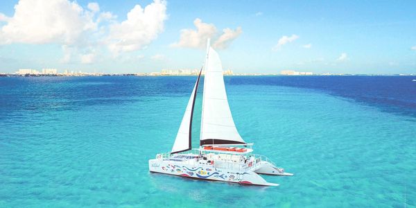 Explore Isla Mujeres: Signature Private Catamaran Charter in Turquoise Waters: 2026