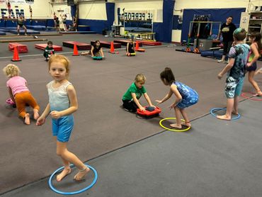 kids at the Gymnastic center enjoying
