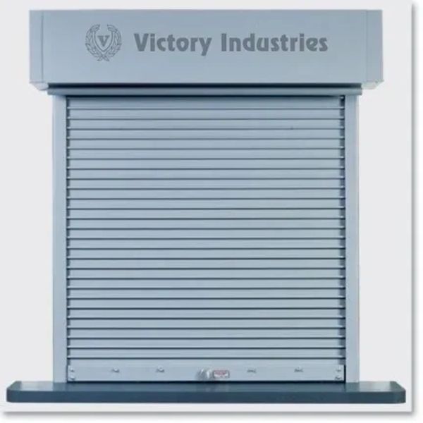 Closed metallic roller shutter of Victory Industries with logo and text.
