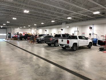 ABRA of Sioux Falls North interior photo of body shop stalls