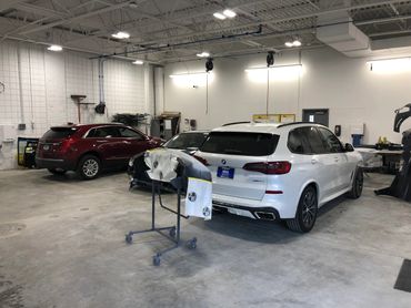ABRA of Sioux Falls South inside photo of cars being repaired