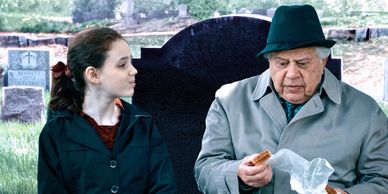 Leilani Marie Vasquez as The Girl and Richie Allan as Elmer in "Abigail" (2019)