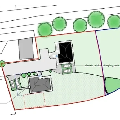 A site plan showing buildings, parking spaces, and an electric vehicle charging point.