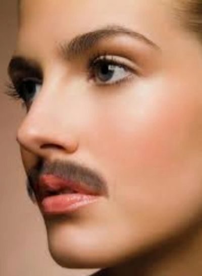 Close-up of a person with a mustache.