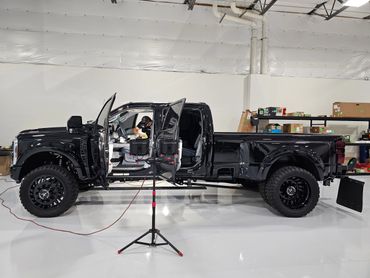 Interior detail on a black Ford F450 dually