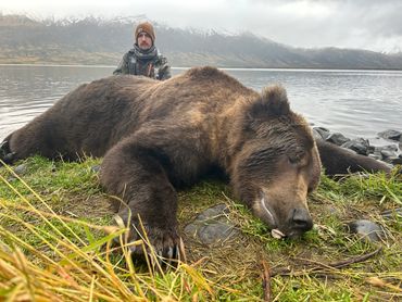 Andew "HETH" Curtis takes a 10' - 2" Brown Bear on the third 4th day hunting.