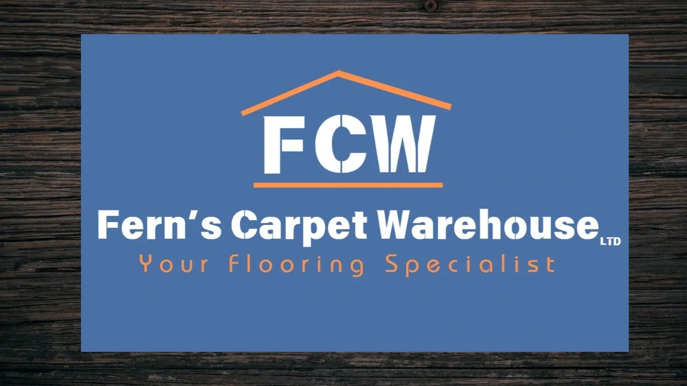 Minimalist white kitchen with modern furniture and blue backsplash.