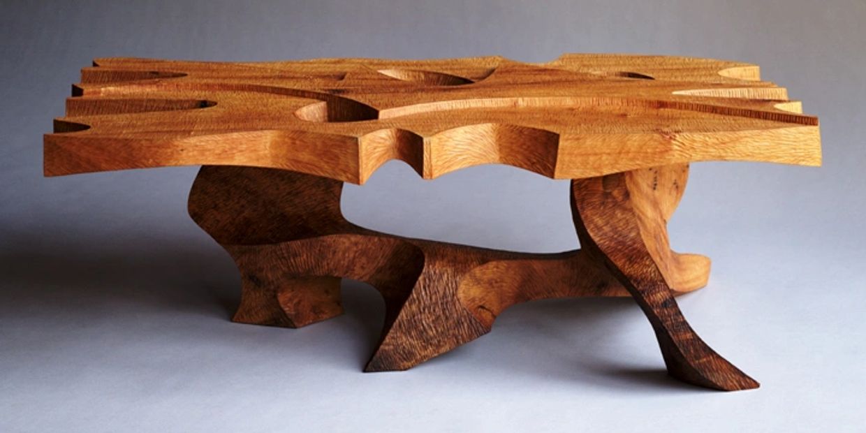 Guardians carved myrtlewood sculptured table