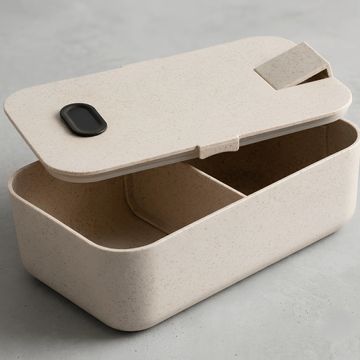 Lonchera beige con tapa y compartimentos.