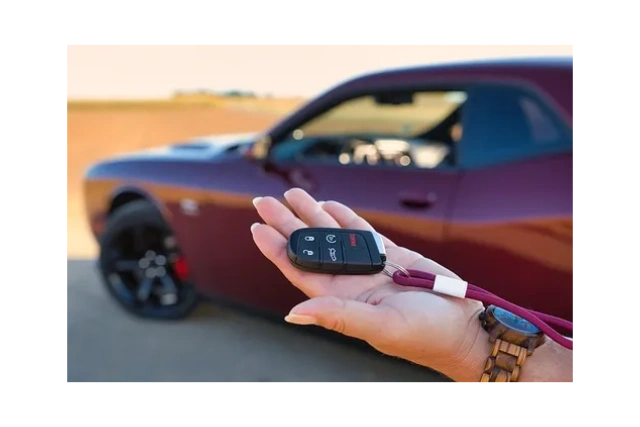 Newley Programmed Smart Key in Hand Dodge Charger.