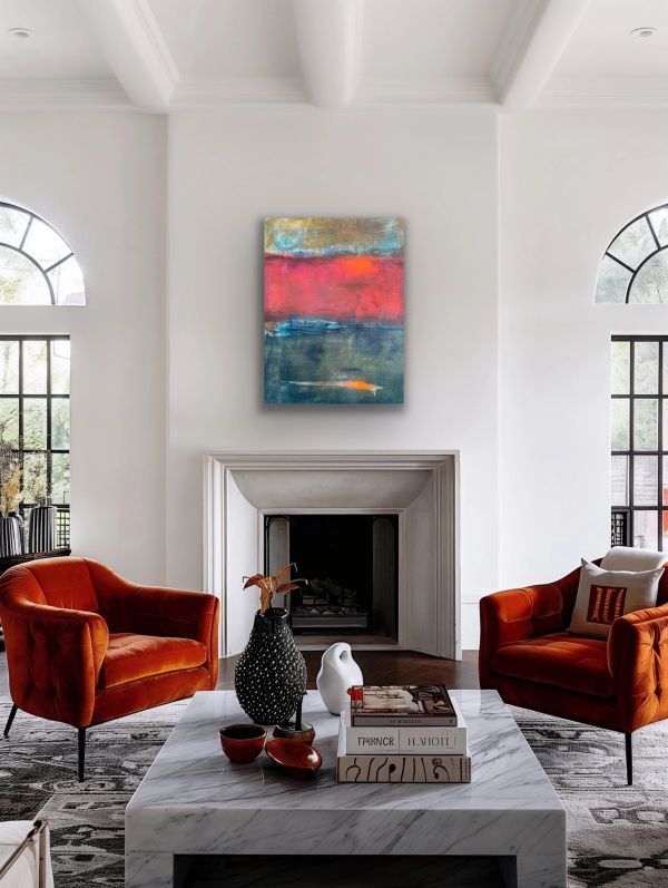 Cozy living room with orange chairs and abstract art.