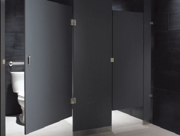 Floor mounted and overhead braced partitions with stainless steel hardware and surface mount hinges.
