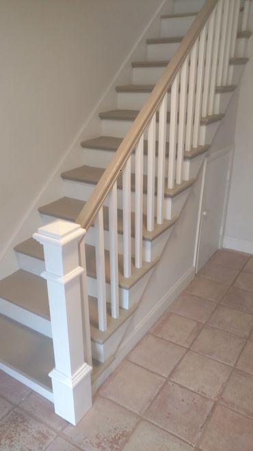 Staircase rebuild and refinish treads rails risers and newel post. Siesta key 