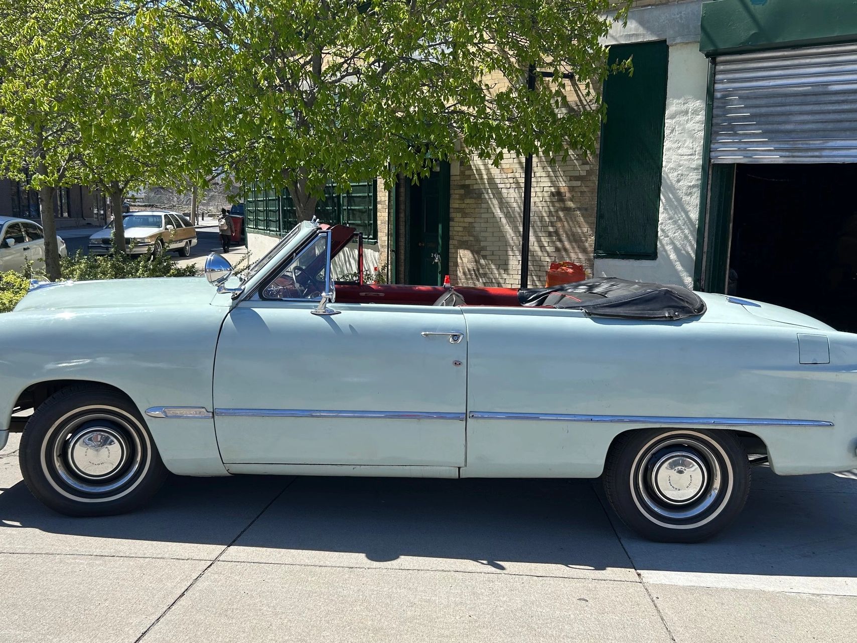 1950 ford convertible side view gree with black interior
